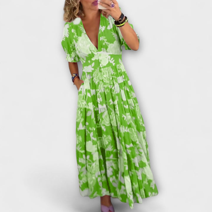 Zora | Blomstret maxikjole med V-hals og lommer