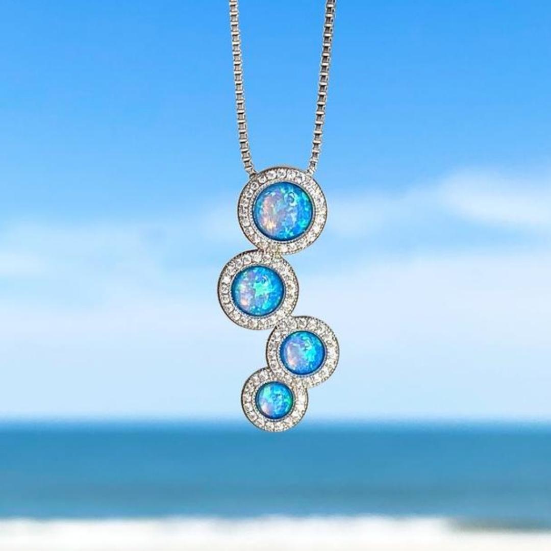 Ørering med Zirkon og Opal i Sölv