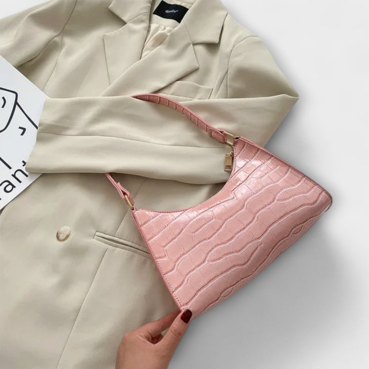 Laura. - Skinnende lædertaske