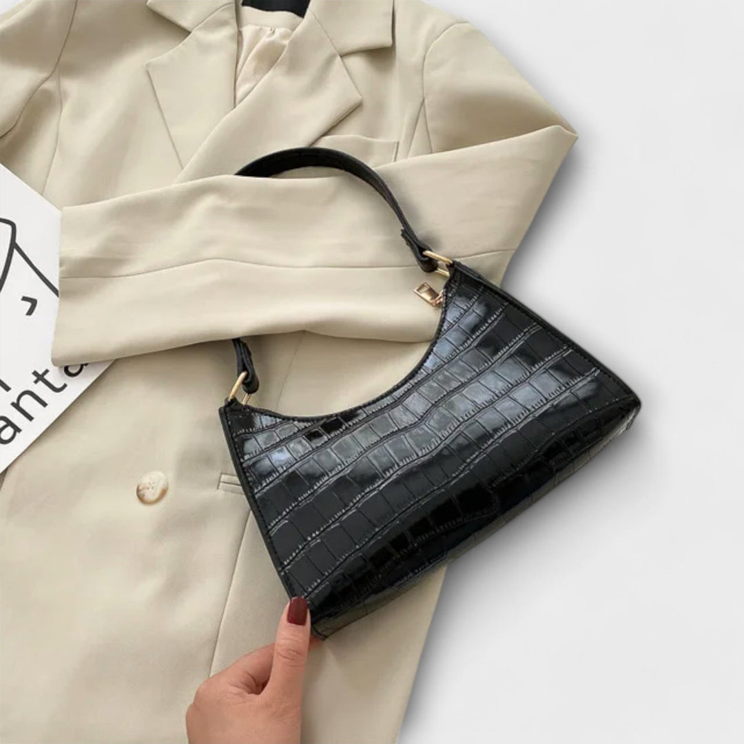 Laura. - Skinnende lædertaske