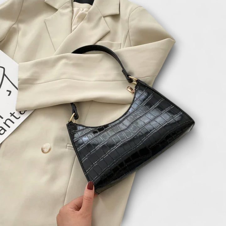 Laura. - Skinnende lædertaske