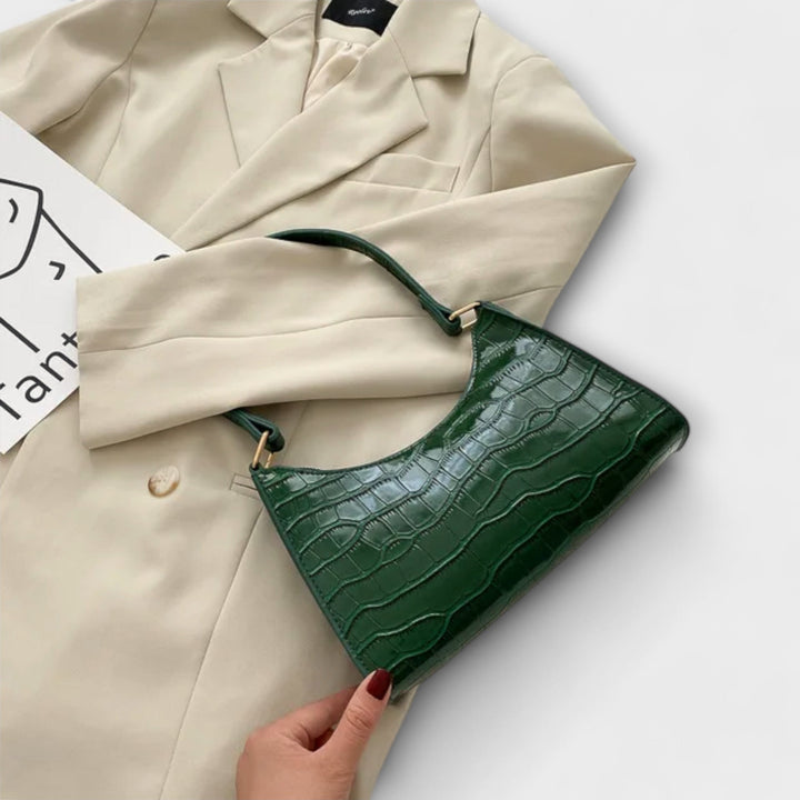 Laura. - Skinnende lædertaske