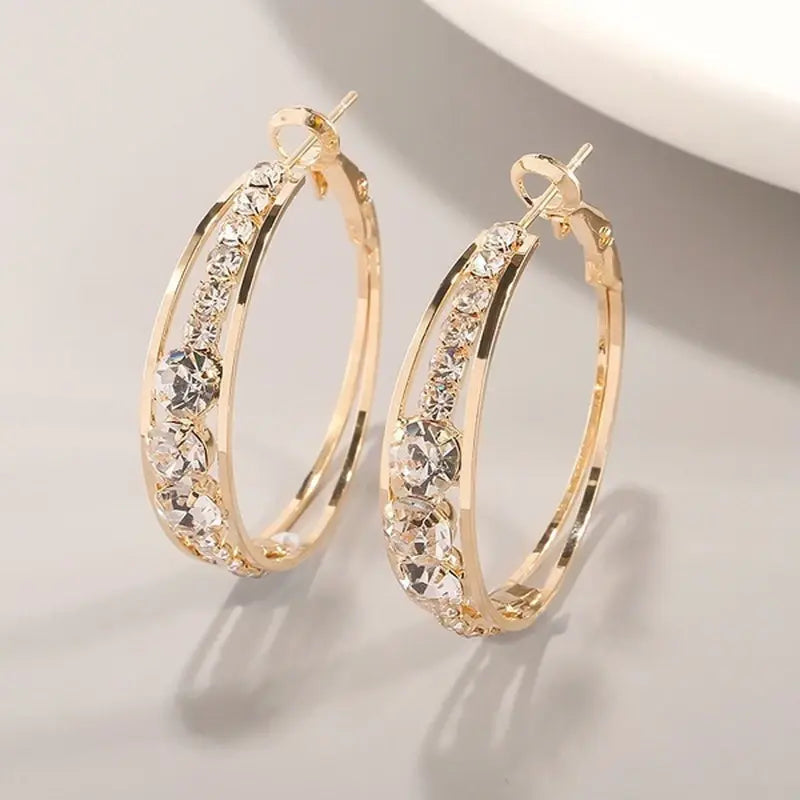 Elegante øreringe i guld