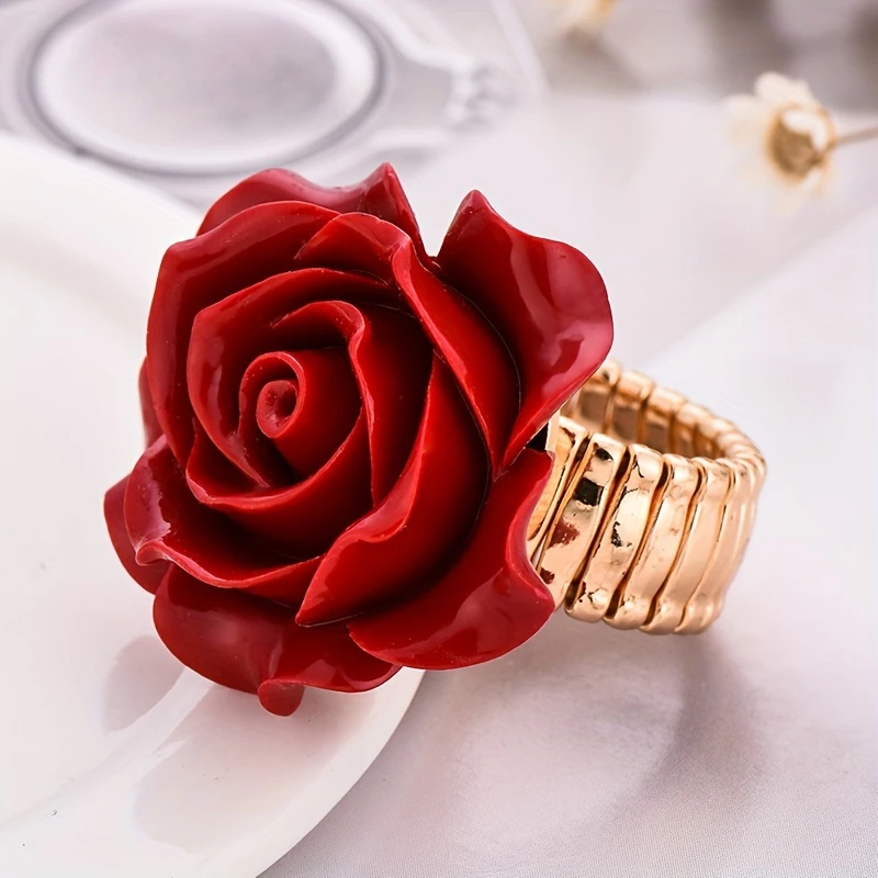 Ring i rosaguld med rød rose 
